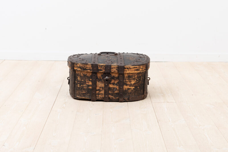 Travel box in pine with enforcements in hand wrought iron. The condition is untouched with minor cracks and signs of wear due to 250 years of use. Manufactured during the late 1700s.