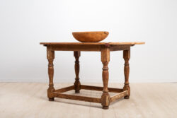 Swedish baroque table in pine with an oval table top.