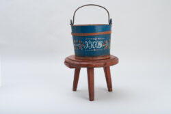 Folk art wooden bucket with decorative painting all around