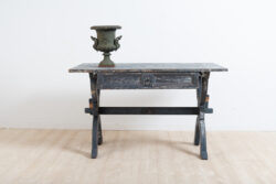 Folk art trestle table with a drawer from northern Sweden. Manufactured drying the late 18th century. Dry scraped to original paint. All parts are original