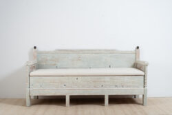 Gustavian provincial sofa from northern Sweden. Hand scraped to the original light blue / green paint. Decorated with carved wooden decor
