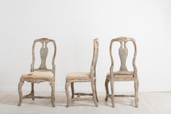 Three late baroque chairs from the middle of Sweden. Manufactured around 1770 the chairs are dry scarped to the original paint. Original seats