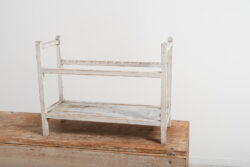 Folk art plate rack in pine. White original paint. From northern Sweden and made during the late 19th century.  For more Miscellaneous