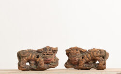 Chinese Foo dogs in original condition. The dogs, sometimes referred to as lion dogs or Chineses guardian lions, are from the 19th century China