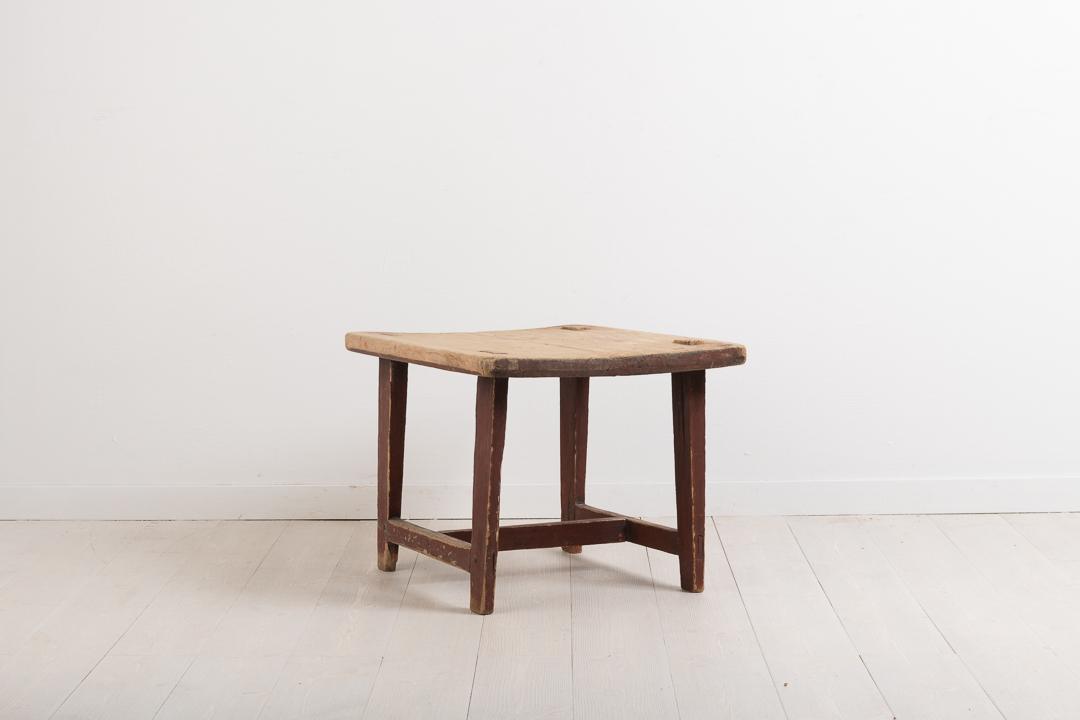 Folk art coffee table or side table. The table is small and primitive and in original untouched condition. Made from pine with a never painted table top