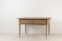 Provincial neoclassical table in painted pine. The table is folk art and primitive with straight legs and a single large drawer. Untouched original condition