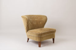 Gösta Jonsson easy chair from the mid 1900s. The chair is Scandinavian modern with the original striped velour upholstery. Made during the 1940s to 1950s in Sweden