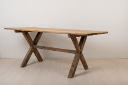 Rustic and primitive table made in pine around the late 1700s. The table is great to use as both and dining table or work table. Clean and well kept