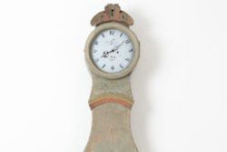 Green long case clock in the classical rococo shape. Scraped to the original first layer of paint of which the colour is a pale green.