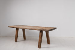Elementary and rustic country table in folk art from Northern Sweden made during the late 1700s. The table is hand-made in solid pine and never painted