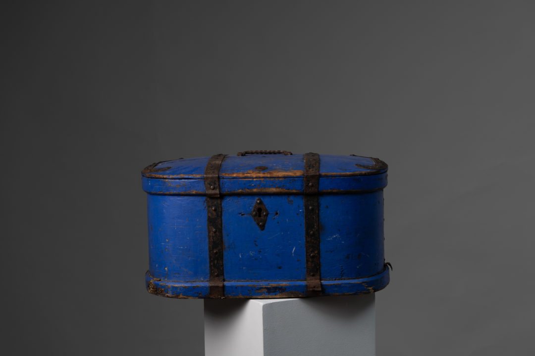 Antique blue traveling box from the 1820s to 1830. This charming little box has bright blue original paint and hand wrought hardware in iron
