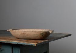 Oblong wood bowl with handles on the sides. Made during the mid 1800s in Northern Sweden. The bowl is in good antique condition consistent