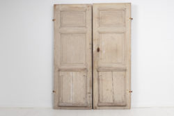 Pair of genuine gustavian doors from the late 1700s in pine. The doors are unusual and in authentic condition with old paint from the 1800s.