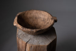 Antique hand-made wood bowl from the first half of the 19th century. The bowl is from northern Sweden and has an unusual decorated handle on the side