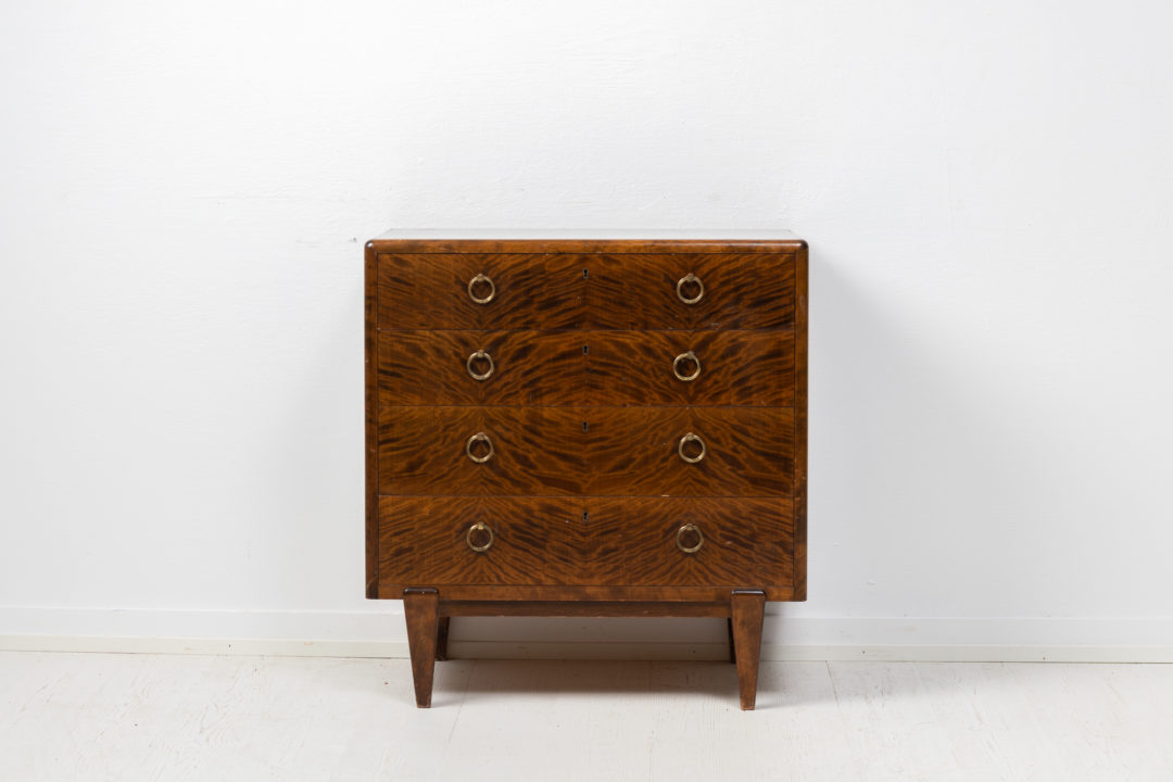 Swedish Art Deco bureau from the early 20th century, around 1920 to 1930. The bureau is stained and polished birch and the structure of the wood is unusual