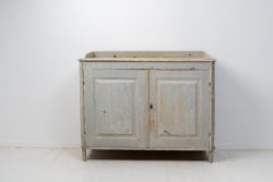 Rare antique gustavian sideboard from Northern Sweden made around 1780. The sideboard is made in painted pine and dry scraped by hand down to the original
