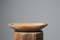 Antique wood trough bowl in folk art from Sweden made during the mid 1800s, around 1850. The bowl is a utility item which was used daily