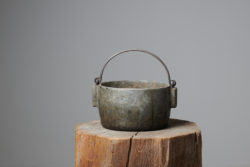 Antique folk art pot hand-made in northern Sweden during the mid 1800s. The pot was an everyday utility item made in soapstone