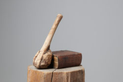 Antique hand-made wooden club in folk art made during the mid 1800s. The club is made by hand from a branch with a burl at the end