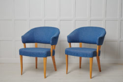 Scandinavian modern “Lata Greven” chairs designed by Carl Malmsten around 1953. Produced by O.H Sjögren. The name means the “lazy count”