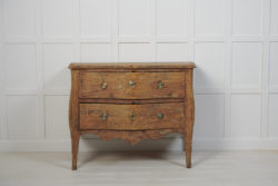 Rare genuine antique Swedish rococo chest of drawers from northern Sweden. The chest is made by hand in Swedish solid pine around 1770.