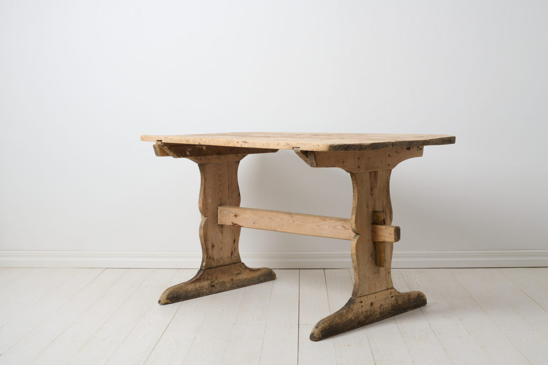 Antique country trestle table from northern Sweden made during the early 1800s. The table is a genuine antique and made by hand in solid pine