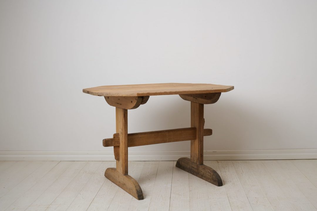 Swedish folk art table from the early 1800s. Trestle table, meaning an early primitive type of table with a loose table top on a leg frame.