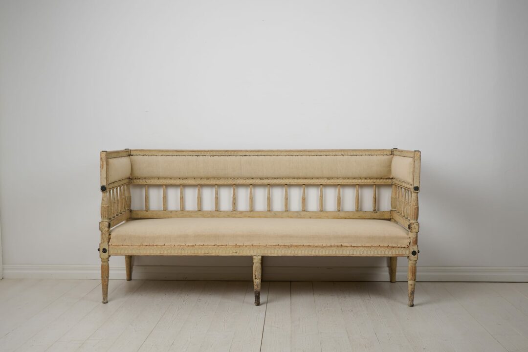 Swedish antique sofa from the gustavian period around the late 1700s. The sofa has a hand-made frame in solid pine