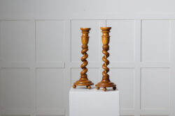 Pair of Swedish empire candlesticks from around 1840 to 1850. The candlesticks are made by hand with a frame in solid birch with elements of birch root