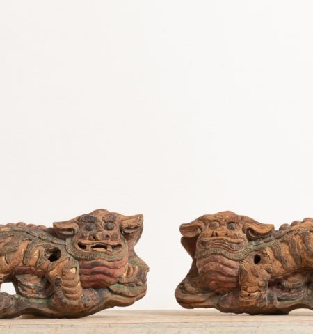 Chinese Foo dogs in original condition. The dogs, sometimes referred to as lion dogs or Chineses guardian lions, are from the 19th century China
