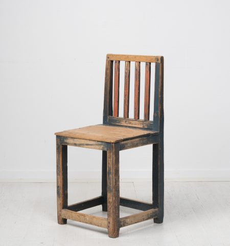 Charming folk art chair from Hälsingland in Sweden. The chair is made during the early 1800s in Swedish pine. It has the original paint