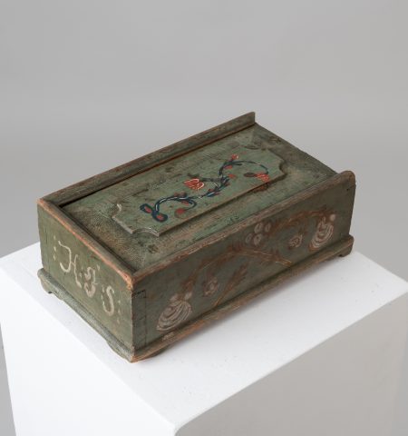 Antique box with siding lid in folk art. The box has the original decoration paint and the dating 1798 as well as a monogram