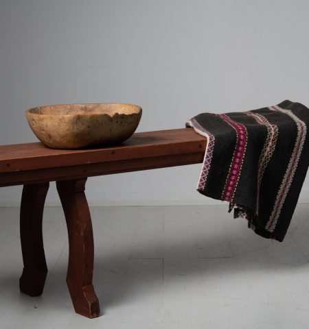 Rare folk art bench from northern Sweden made during the mid 1800s. The bench is hand-crafted in Sweden from pine