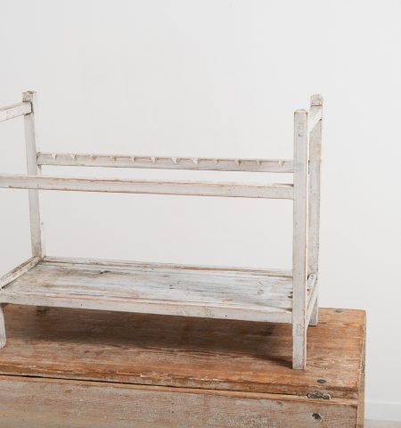 Folk art plate rack in pine. White original paint. From northern Sweden and made during the late 19th century.  For more Miscellaneous