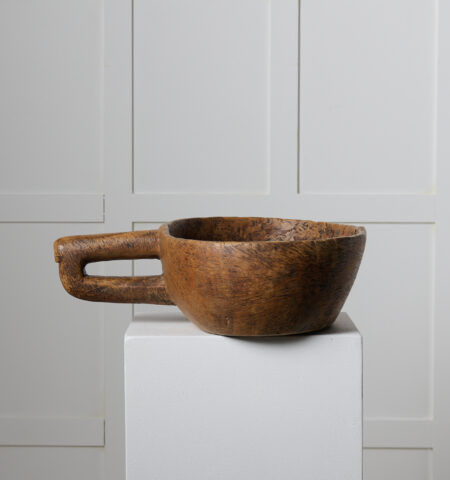 Rare Swedish antique bowl from the late 1700s. This wooden bowl is oval with a carved handle on the side. Made by hand from a single piece of birch root
