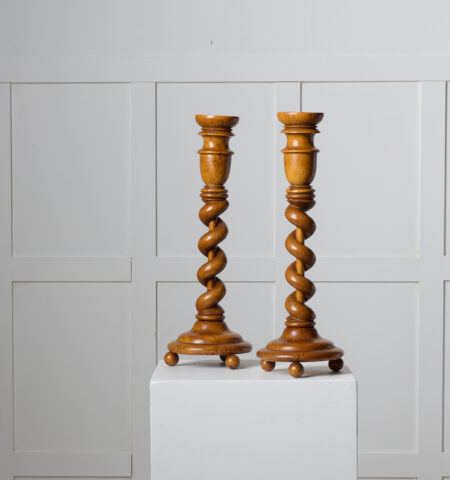 Pair of Swedish empire candlesticks from around 1840 to 1850. The candlesticks are made by hand with a frame in solid birch with elements of birch root