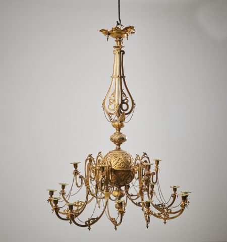 Antique Swedish bronzed chandelier made during the mid 1800s, around 1850 to 1860. The chandelier is made in bronzed metal with a richly decorated round frame