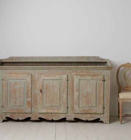 Wide Swedish antique sideboard. This sideboard is a country house furniture from the gustavian period made in northern Sweden around 1790.