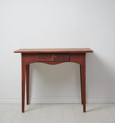 Charming folk art table with straight legs, a drawer and curved apron. The table is completely untouched with the authentic patina
