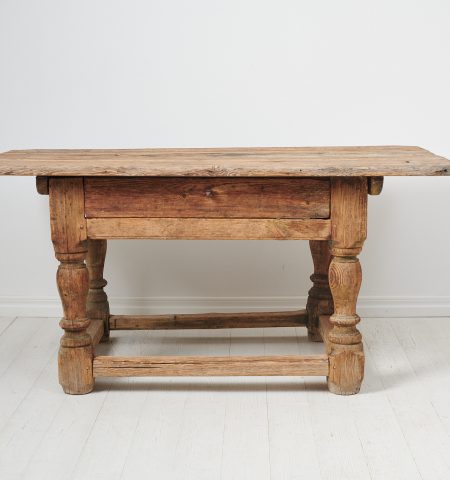 Unique Swedish baroque table made by hand during the mid 1700s. The table is a very rare example of early Swedish furniture and has a frame in pine with heavy, solid lathed legs.
