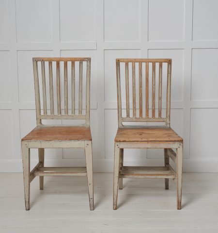 Antique Swedish country chairs from the early 1800s, around 1820 to 1830. The chairs are genuine country house furniture made in gustavian style.