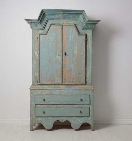 Rare Swedish blue cabinet in folk art from around 1820. This type of cabinet was only made and can only be found the county Jämtland
