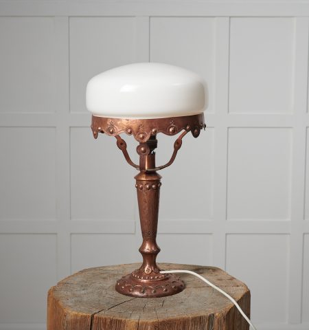 Swedish art nouveau light from the 1920s. The table light has a base made by hand in solid brass with decor. The shade is round