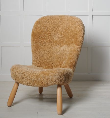 Rare Scandinavian-modern Clam Chair by Arnold Madsen and produced by Madsen & Schubell. This chair is a genuine vintage chair made in Denmark