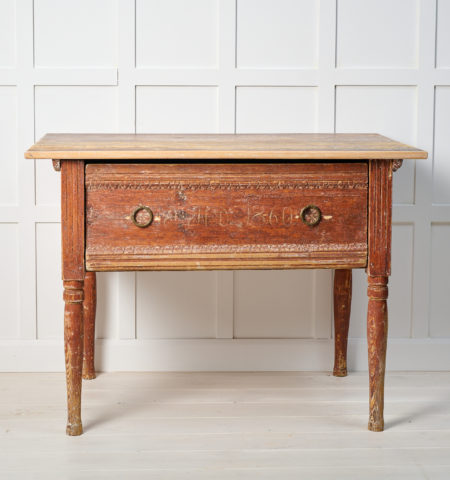 Antique Swedish country table dated 1860. The table is a genuine country house furniture that has been dry scraped by hand to the first layer of paint