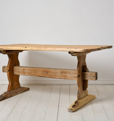 Folk art trestle table, dining or work table from northern Sweden. The table is a genuine antique and made unusually sturdy and