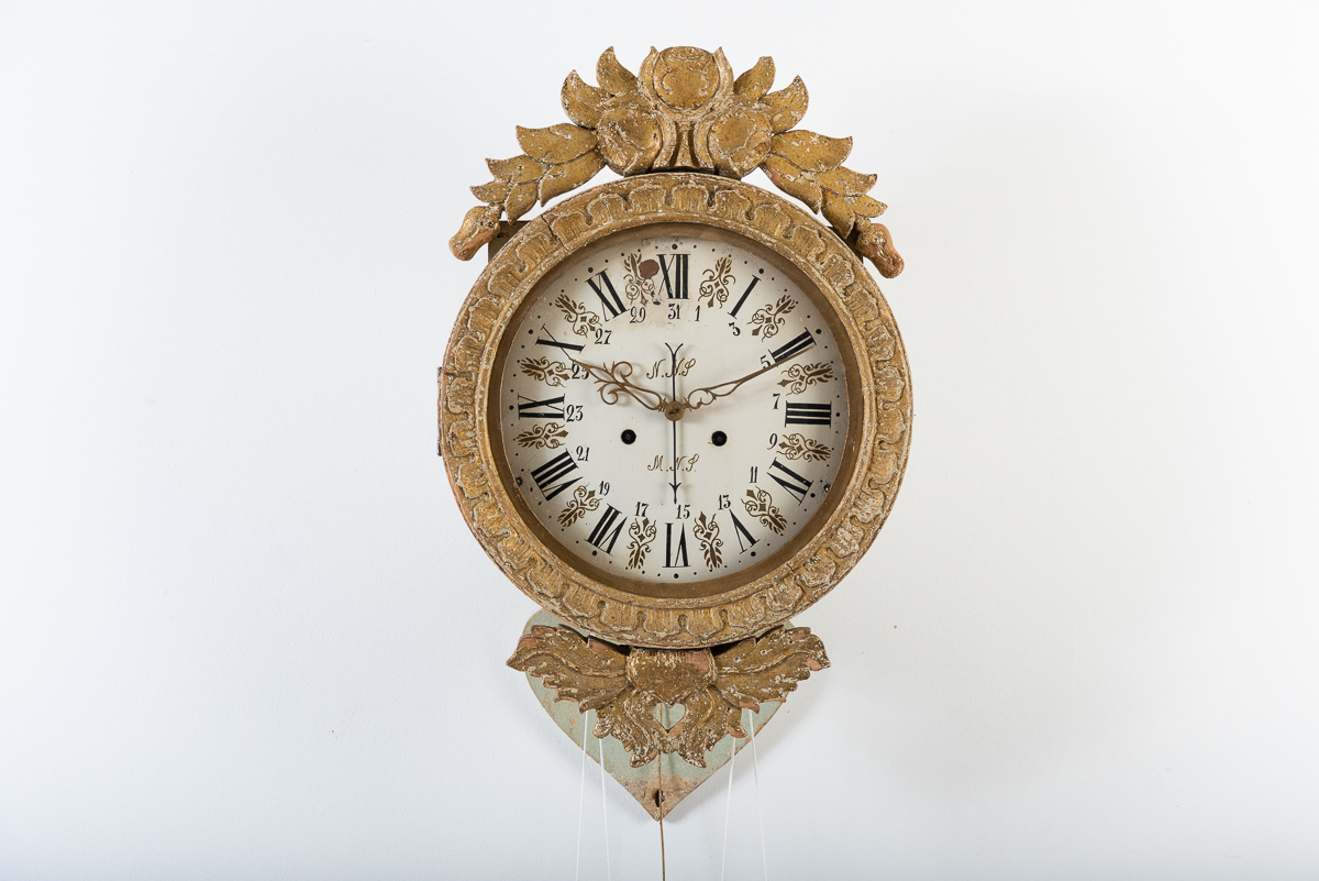 Folk art wall clock