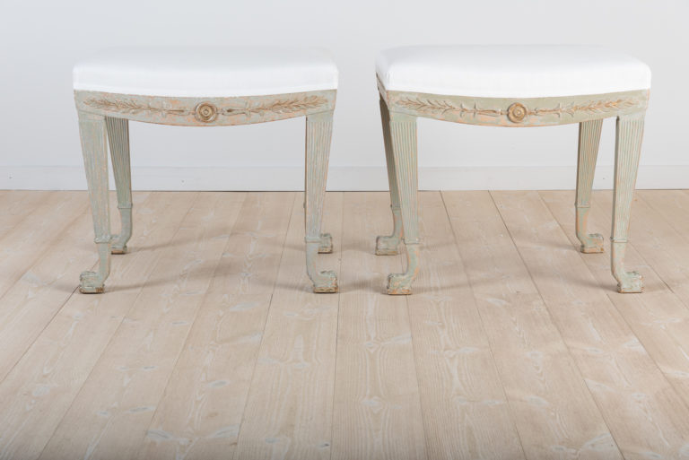 A pair of Swedish empire tabourets