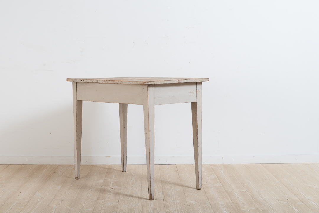 Gustavian provincial window table. In untouched condition with grey original paint. Simple and charming the table got its name from its area of use