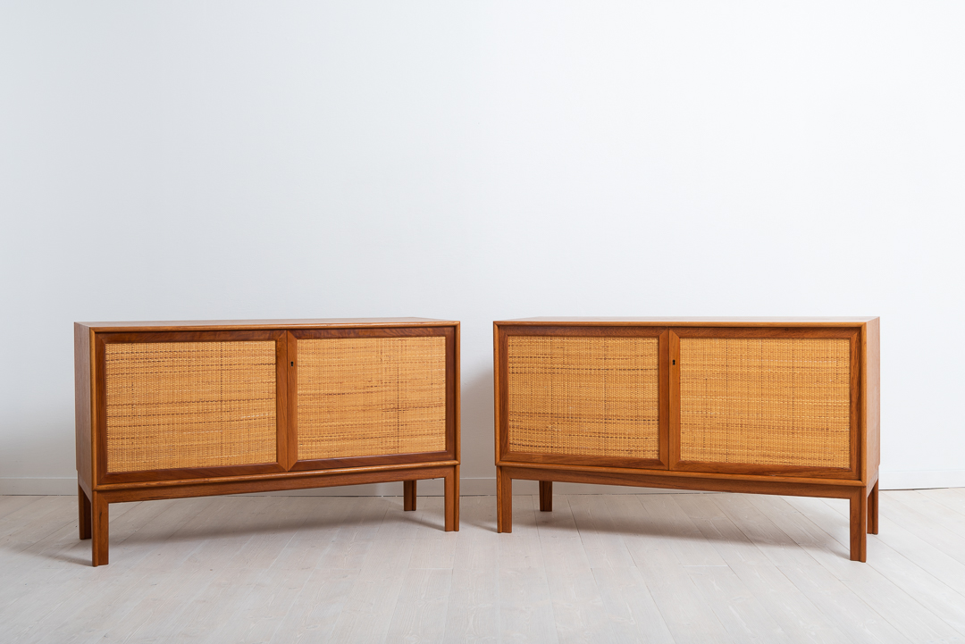 Pair of sideboards in teak by Alf Svensson for Bjästa Snickerifabrik. Doors dressed in rattan. Made around 1960.